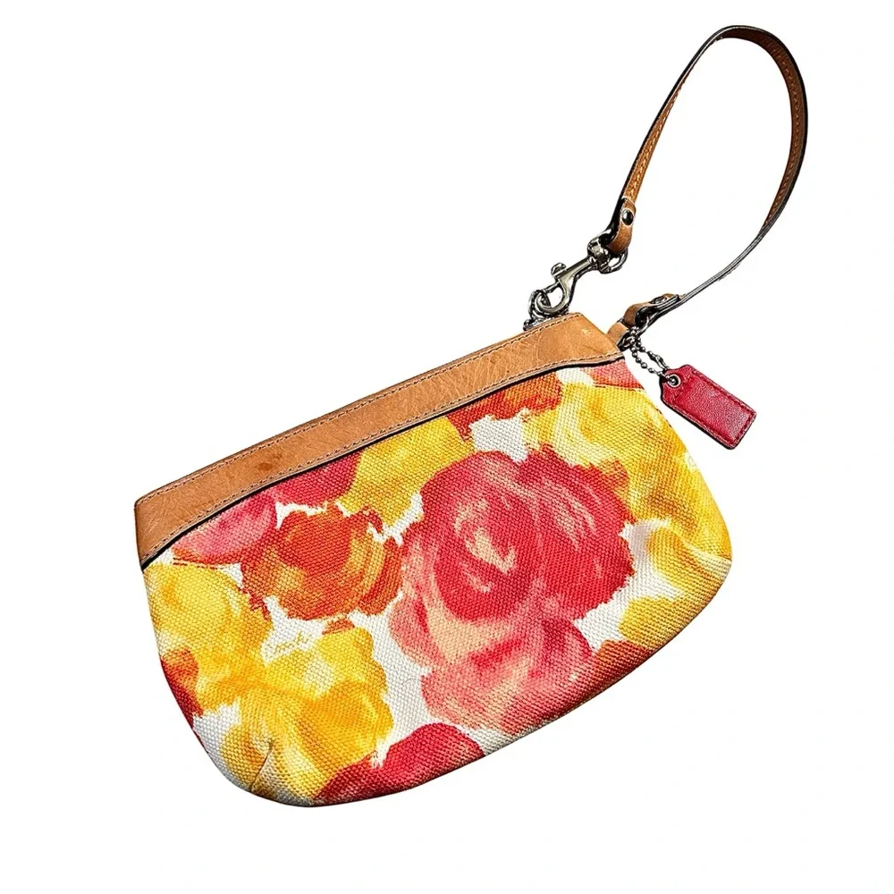 Coach Leather Fabric Floral Wristlet bag Zip close Satin lined